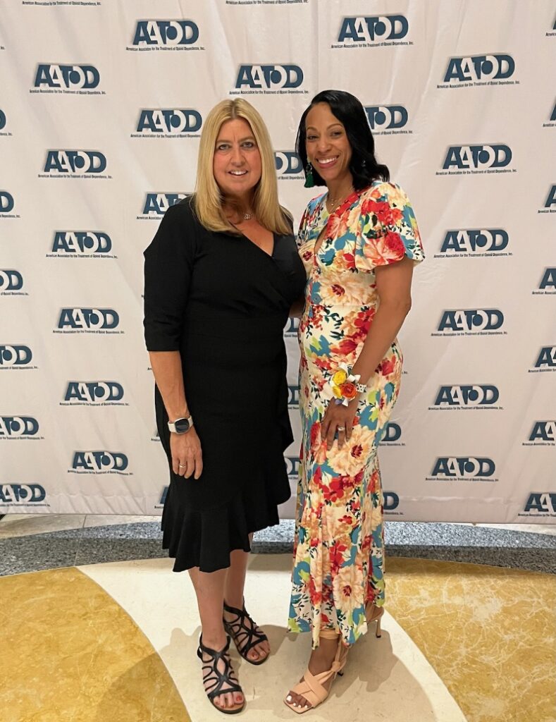 Maiysha and Maggie pose together during award ceremony